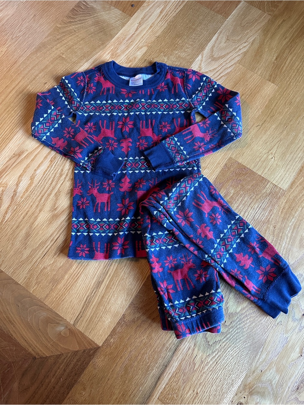 Hanna Andersson two-piece long john pajama set in a navy holiday Fair Isle print